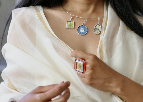 Story-rich, head-turning, hasli (neck ring) with miniature painting pendants
