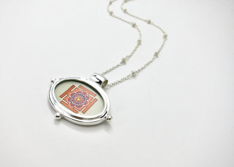 Exquisite, oval Lotus Yantra pendant on a floating pearl chain - Lai